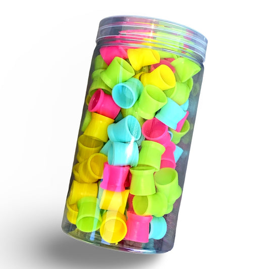 Multi coloured silicone pigment cups in a jar