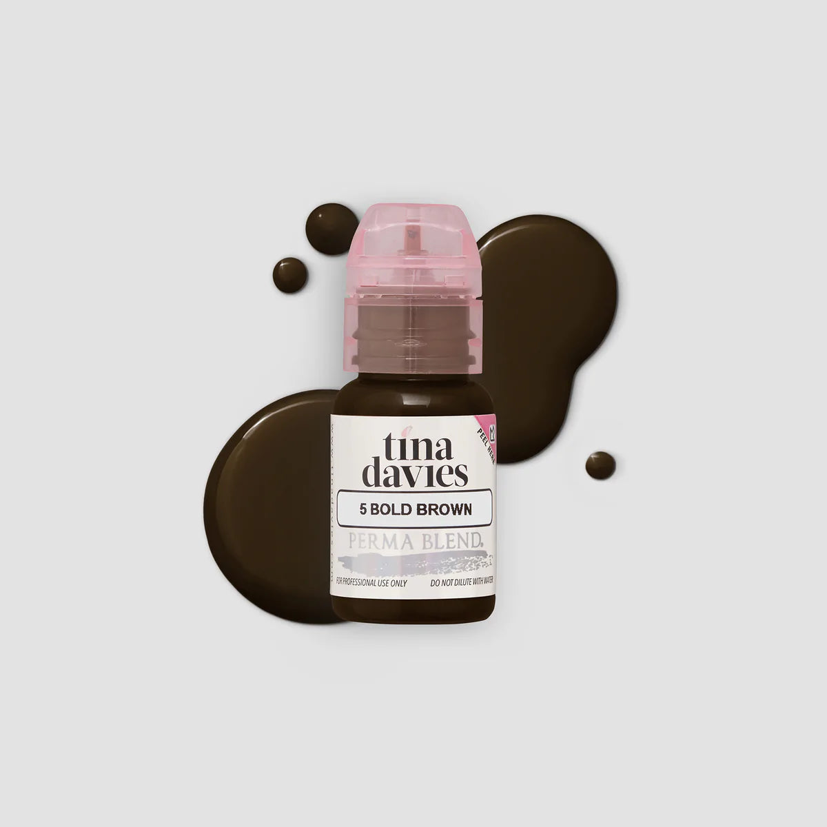 Tina davies bold brown pigment in a bottle with a transparent pink lid